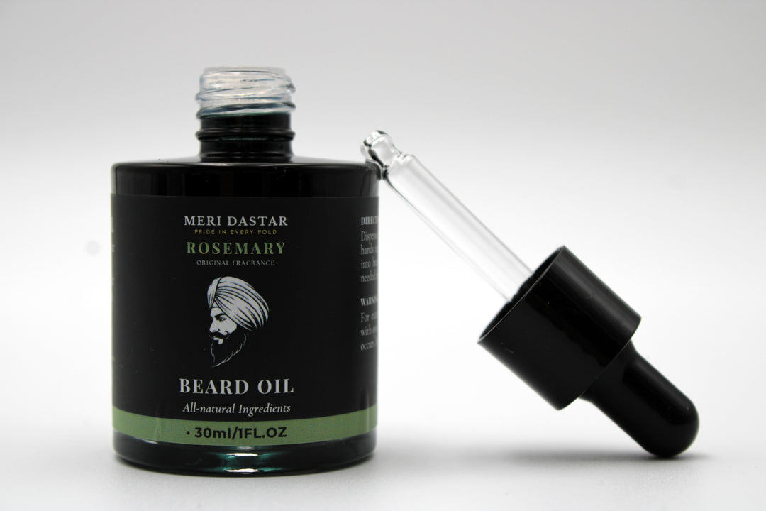 Beard oil bottle with dropper labeled 'Meri Dastar' on a white background