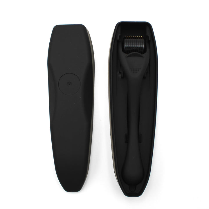 Black grooming derma roller on a white background