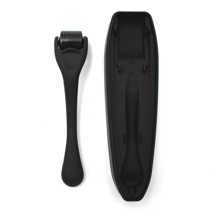 Black derma roller tool with roller head and handle on a white background