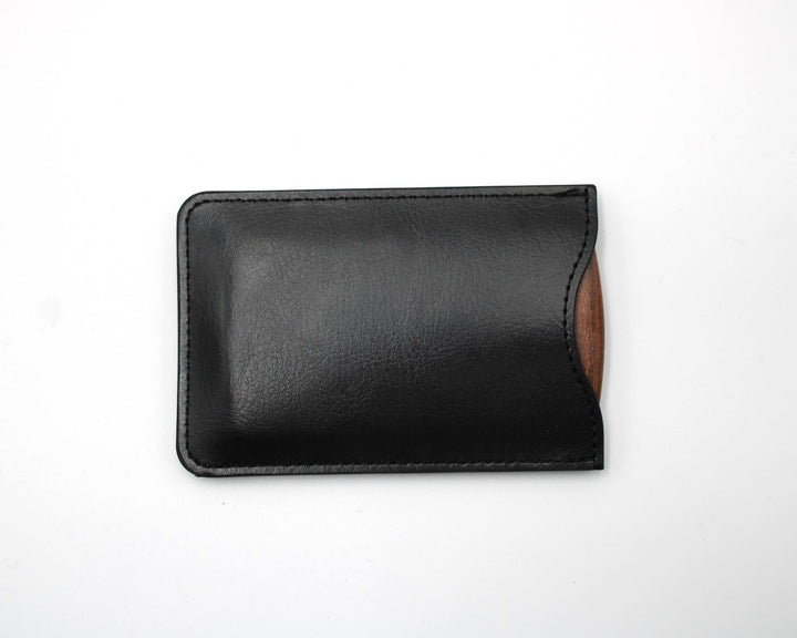 Black leather pouch on a white background