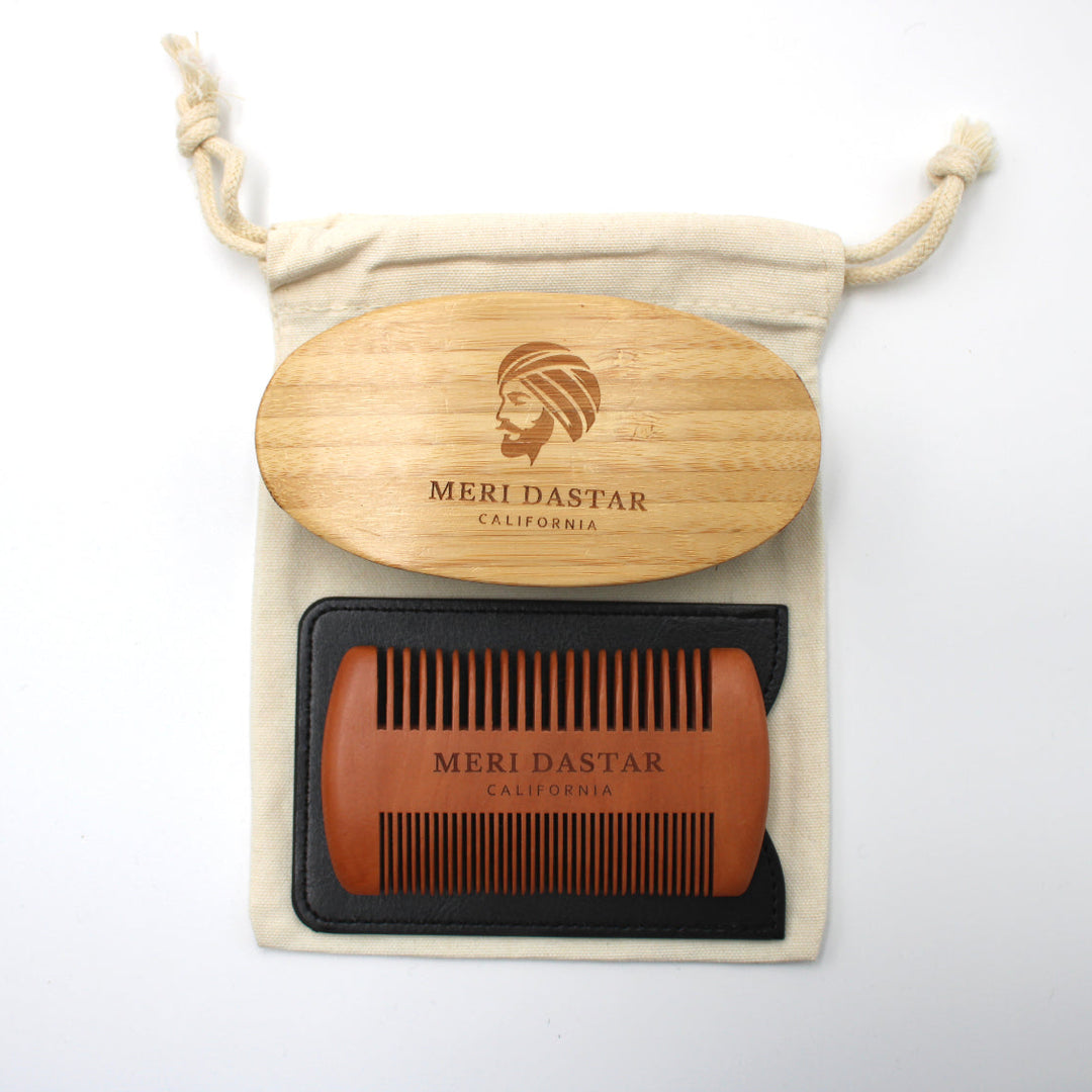 Beard comb and wooden brush set with Meri Dastar branding on a white background